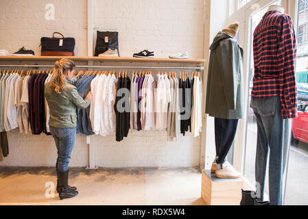 Model released. Caughley is a boutique shop located at 57 Ghuznee Street in Te Aro, Wellington, New Zealand. Stock Photo