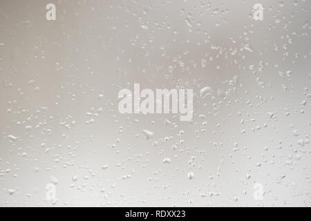 background with macro water drops on glass. Stock Photo