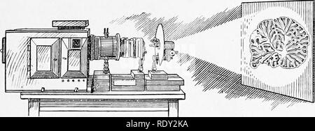 Modern microscope with glass slide on white table in laboratory Stock ...