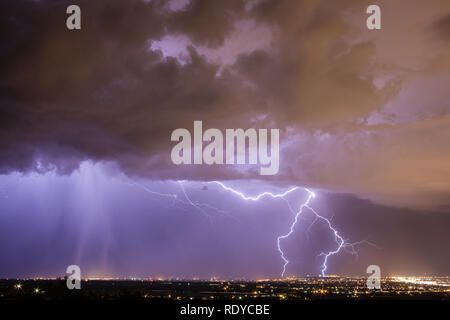 Heavy Rain and Vivid Lightning Pound Las Cruces, New Mexico during the Summer Monsoon Season Stock Photo