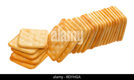 Stack of square crackers isolated on white background. Dry cracker cookies isolated with clipping path Stock Photo