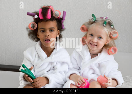 International friendship of different nationalities. Girls friends of different skin color and religion are best friends. Stock Photo
