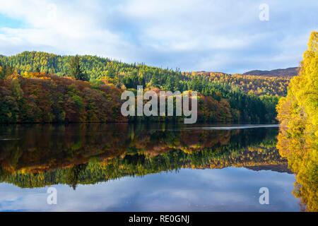 Autumn reflections on Loch Faskally near Pitlochry, Perthshire, Scotland