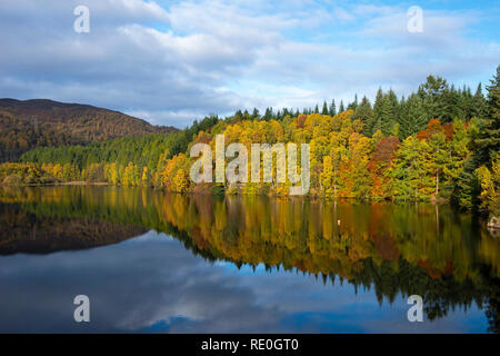 Autumn reflections on Loch Faskally near Pitlochry, Perthshire, Scotland