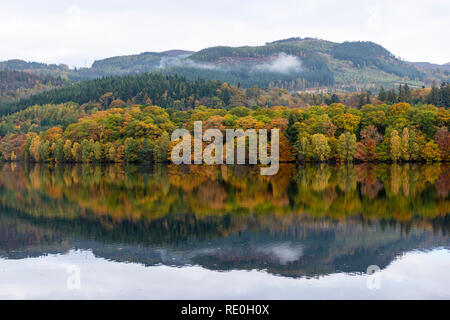 Autumn reflections on Loch Faskally near Pitlochry, Perthshire, Scotland Stock Photo