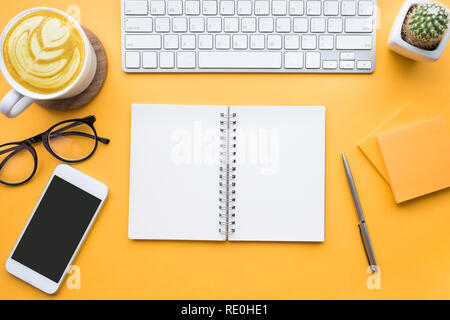Top view of office desk table with modern accessories,supplies on color background.flat lay design.business concepts ideas Stock Photo