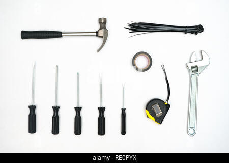 Flat lay of arranged tools and instruments in strict order on white background Stock Photo