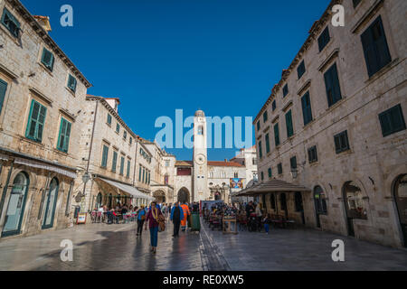 Dubrovnik, Croatia - April 2018 : Tourists walking, sightseeing or sitting in restaurants in the Dubrovnik Old Town Stock Photo