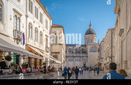 Dubrovnik, Croatia - April 2018 : Tourists walking, sightseeing or sitting in restaurants in the Dubrovnik Old Town Stock Photo