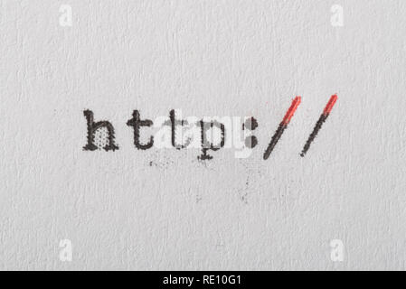 The primary prefix "http://" to all webpages, typed out by a 1950s-era typewriter on paper. Stock Photo