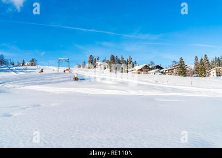 SEEFELD, AUSTRIA - JANUARY 12, 2019: People enjoy skiing on slopes in Seefeld, well known for it's winter sports centres and amongst the most popular  Stock Photo