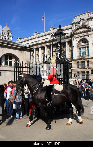 Royal Horse Guard on his horse during the Changing of the Guard in front of the Horse Guards historic building in London, United Kingdom Stock Photo