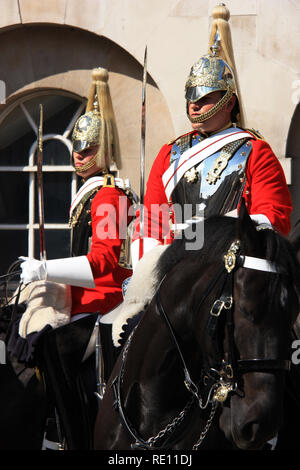 Royal Horse Guards on their horses during the Changing of the Guard in front of the Horse Guards historic building in London, United Kingdom Stock Photo