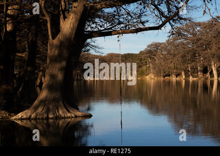 Rope Swing at the Frio River in Garner State Park, Texas Stock Photo