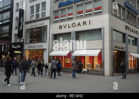 Designer shops on the corner of Wallrafpl and Hohe Street in the heart of the main shopping district in Cologne. Stock Photo