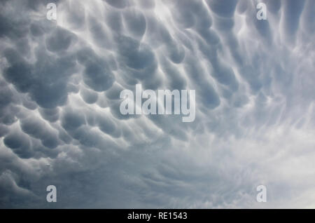 Dramatic ominous atmospheric mammatus clouds before a thunderstorm in western Sydney, NSW, Australia Stock Photo