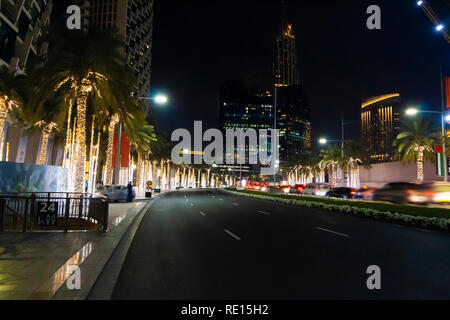 Walk through the streets of the night in Dubai. Stock Photo