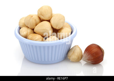 Hazelnuts in bowl isolated on white background Stock Photo