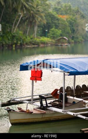 Boat trips on the Loboc river. Loboc Bohol. Pleasure boat on the River Loboc, Bohol, Philippines Stock Photo