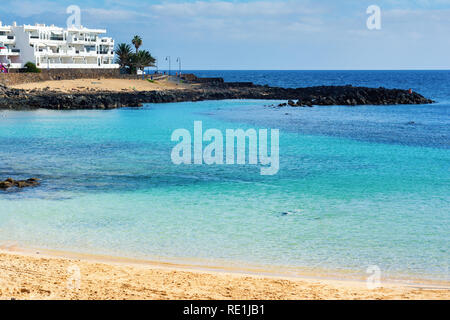 View of Playa Bastian beach in Costa Teguise, Lanzarote, Spain, clear turquoise waters, selective focus Stock Photo