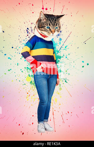 Contemporary art collage full body portrait casual kitten headed woman wear jeans and rainbow sweater posing with hand in pocket. Modern style pop art Stock Photo