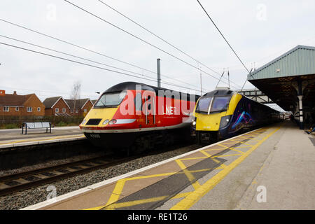 LNER Class 43, 43305, and First Hull Trains, Class 180 Adelante waiting at the platform, Grantham railway station, Lincolnshire, England Stock Photo