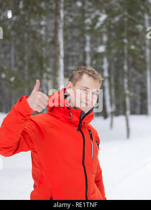Happy man giving thumbs up sign - full length portrait on white background Stock Photo