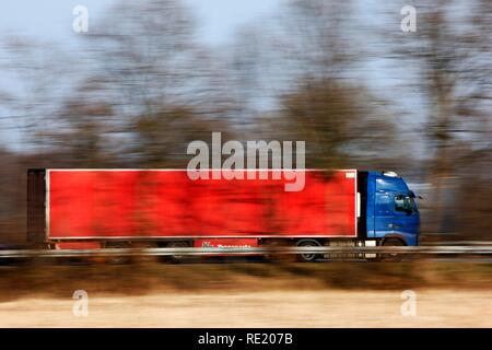 Truck with red trailer on highway, Niederrhein, North Rhine-Westphalia Stock Photo