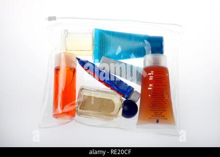 Transparent plastic bag for small quantities of liquids, gels, pastes, creams, which may be carried in hand luggage for air Stock Photo