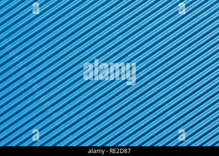 Abstract textured background created with striped details of blue corrugated cardboard Stock Photo
