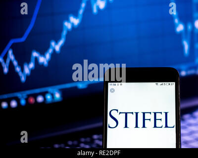 Stifel Investment banking company  logo seen displayed on smart phone Stock Photo