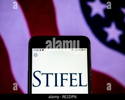 Stifel Investment banking company  logo seen displayed on smart phone Stock Photo