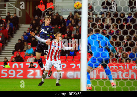 Stoke on Trent, UK. 19th Jan 2019. Jack Clarke of Leeds United (L) heads a chance at goal. EFL Skybet championship match, Stoke City v Leeds United at the Bet365 stadium in Stoke on Trent on Saturday 19th January 2019.  this image may only be used for Editorial purposes. Editorial use only, license required for commercial use. No use in betting, games or a single club/league/player publications. pic by Steffan Bowen/Andrew Orchard sports photography/Alamy Live news Stock Photo