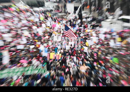 Washington, USA. 19th Jan, 2019. Protesters gather near the freedom plaza in Washington, DC, the United States, Jan. 19, 2019. Thousands of women gathered in Washington, DC on Saturday for the third Women's March, supporting women's rights while denouncing racism and violence against women. Credit: Liu Jie/Xinhua/Alamy Live News Stock Photo