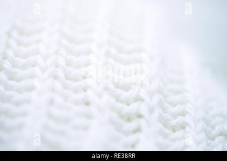 macro background white wool knitted textiles Stock Photo