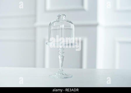 Glass vase for cookies with cover, on white background Stock Photo