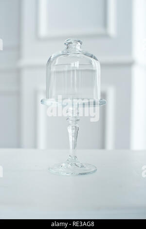 Glass vase for cookies with cover, on white background Stock Photo