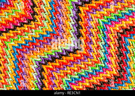 Abstract multicolored zig zag material background Stock Photo