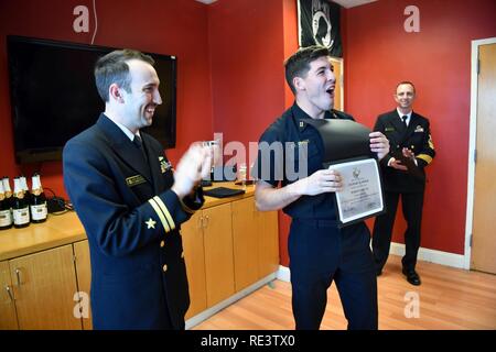 ANNAPOLIS, Md. (Nov. 17, 2016) U.S. Naval Academy first-class midshipmen receive their service assignments during a ceremony in Bancroft Hall. At this annual event, midshipmen learn which warfare community they will join after graduation, in May. Stock Photo