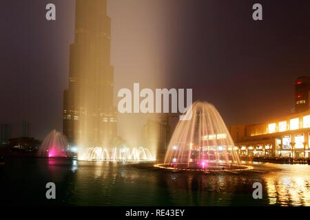 Fountain at the Lake Dubai, the world's largest fountain, evening show, Downtown Dubai, United Arab Emirates, Middle East Stock Photo