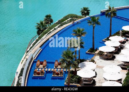 Pool area of the luxury hotel The Address, part of Downtown Dubai, United Arab Emirates, Middle East Stock Photo