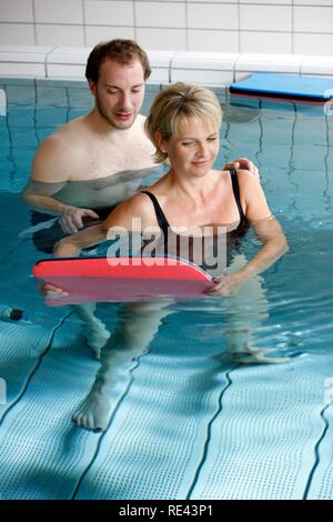 People in the spa pools of the therapy facilities in Hajduszoboszlo ...