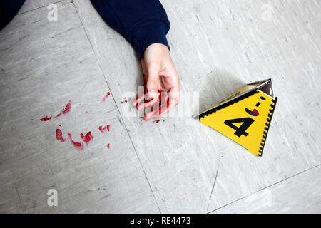 Securing forensic evidence at a crime scene after a capital offence, homicide, by the C.I.D., the Criminal Investigation Stock Photo