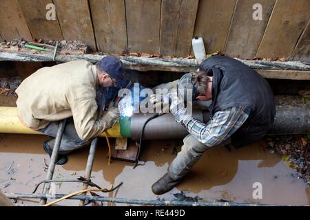 Work on a gas line, installing a new pipe for a defective part, city gas, Gelsenkirchen, North Rhine-Westphalia Stock Photo