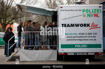 Advertising for the police NRW at a school, infromation truck, Duisburg, North Rhine-Westphalia Stock Photo