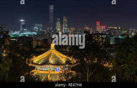 Beijing / China - October 10th 2018: Panoramic night view of the skyscrapers of the Central Business District in Beijing, as seen from Jingshan park