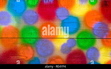 Full frame shot of a multi  colored  hand-painted wooden wall by children in park Stock Photo