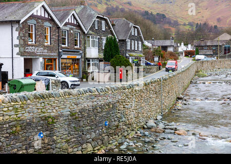 Houses and shops in Glenridding village centre, Ullswater,Lake District. Glenridding was damaged by storm desmond in 2015,Cumbria,England Stock Photo