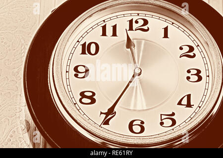 Wall pendulum clock with the fight in the old style. Stock Photo