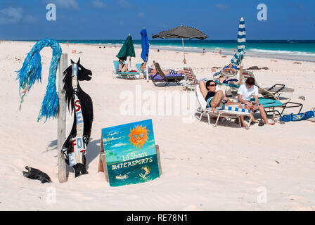 Tourists at Pink Sand Beach. Dunmore Town, Harbour Island, Eleuthera. Bahamas Stock Photo